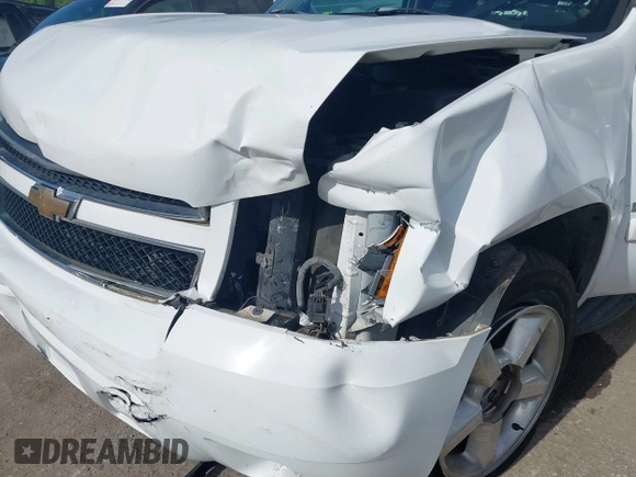 2007 Chevrolet Tahoe LT with VIN 1GNFC13J97R314853, listed as a IAAI auction lot 42684980 with 312,399 mi miles and . Bid and sale history available at DreamBid. Image 6.