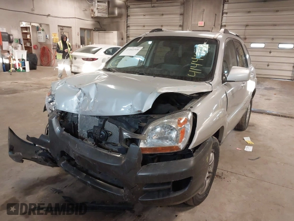 2005 Kia Sportage LX with VIN KNDJE723X57071792, listed as a IAAI auction lot 41441318 with 249,652 mi miles and . Bid and sale history available at carsss.com. Image 6.