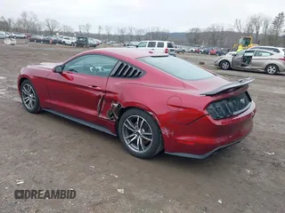 2015 Ford Mustang EcoBoost with VIN 1FA6P8TH6F5357867, listed as a IAAI auction lot 42011136 with 58,099 mi miles and . Bid and sale history available at carsss.com. Image 3.