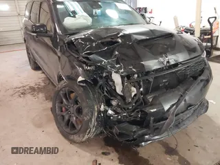 2023 Dodge Durango SRT Hellcat Premium with VIN 1C4SDJH90PC557375, listed as a IAAI auction lot 41328850 with 30,697 mi miles and . Bid and sale history available at DreamBid. Image 16.