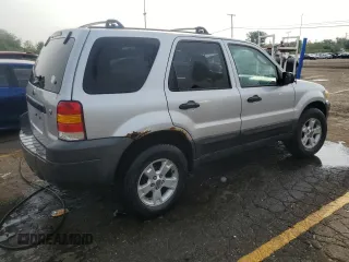2006 Ford Escape XLT with VIN 1FMYU03196KC63432, listed as a Copart auction lot 66897524 with 214,049 mi miles and Clean Title. Bid and sale history available at carsss.com. Image 3.