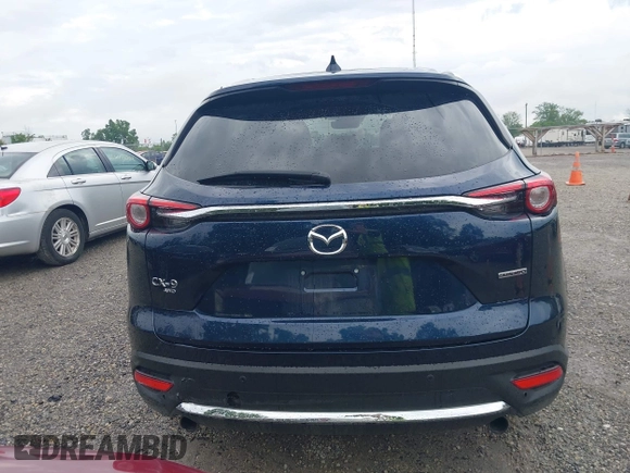 2021 Mazda CX-9 Carbon Edition z VIN JM3TCBDY7M0536005, wystawiony jako IAAI lot #42424129 z przebiegiem 48 005 mil mil oraz . Historia ofert i sprzedaży dostępna na DreamBid. Obrazek 17.