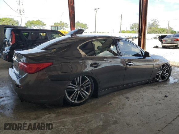 2015 Infiniti Q50 with VIN JN1BV7AP4FM335961, listed as a Copart auction lot 61829295 with 130,327 mi miles and Salvage title. Bid and sale history available at DreamBid. Image 3.