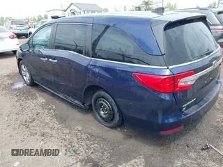 2019 Honda Odyssey EX with VIN 5FNRL6H50KB018150, listed as a IAAI auction lot 42119727 with 94,535 mi miles. Bid and sale history available at carsss.com. Image 3.