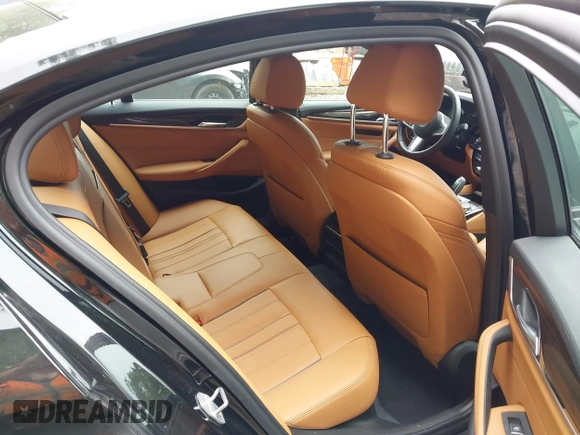 2018 BMW 5 Series 540i xDrive with VIN WBAJE7C58JG891098, listed as a IAAI auction lot 42331320 with 55,172 mi miles and . Bid and sale history available at DreamBid. Image 8.