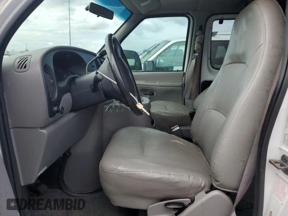 2000 Ford Econoline Passenger XL with VIN 1FBSS31L1YHB80264, listed as a Copart auction lot 74762814 with 61,702 mi miles and Salvage Title. Bid and sale history available at DreamBid. Image 7.