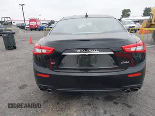 2015 Maserati Ghibli z VIN ZAM57XSA4F1151843, wystawiony jako IAAI lot #38392898 z przebiegiem 88 147 mil mil oraz . Historia ofert i sprzedaży dostępna na DreamBid. Obrazek 16.
