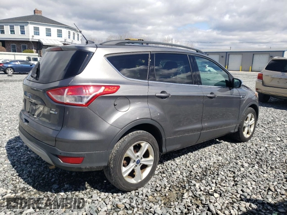 2014 Ford Escape SE with VIN 1FMCU9G9XEUA96094, listed as a Copart auction lot 52260805 with 143,791 mi miles and Clean Title. Bid and sale history available at DreamBid. Image 3.