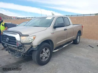 2007 Toyota Tundra SR5 with VIN 5TFRV54197X031872, listed as a IAAI auction lot 41593418 with 246,426 mi miles. Bid and sale history available at carsss.com. Image 2.