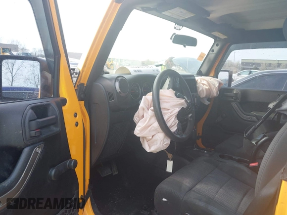 2012 Jeep Wrangler Sport with VIN 1C4AJWAG0CL128595, listed as a IAAI auction lot 42048590 with 133,085 mi miles and . Bid and sale history available at DreamBid. Image 8.
