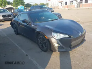 2013 Scion FR-S z VIN JF1ZNAA1XD2709010, wystawiony jako IAAI lot #42264107 z przebiegiem 144 768 mil mil oraz . Historia ofert i sprzedaży dostępna na DreamBid. Obrazek 1.