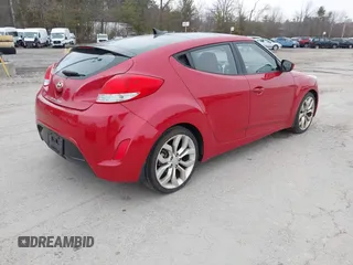 2012 Hyundai Veloster w/Black Int with VIN KMHTC6AD7CU072850, listed as a IAAI auction lot 41868715 with 141,792 mi miles and . Bid and sale history available at DreamBid. Image 4.