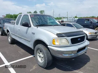 1997 Ford F-150 with VIN 2FTDX18W4VCA70578, listed as a IAAI auction lot 42250386 with 165,114 mi miles and . Bid and sale history available at DreamBid. Image 1.