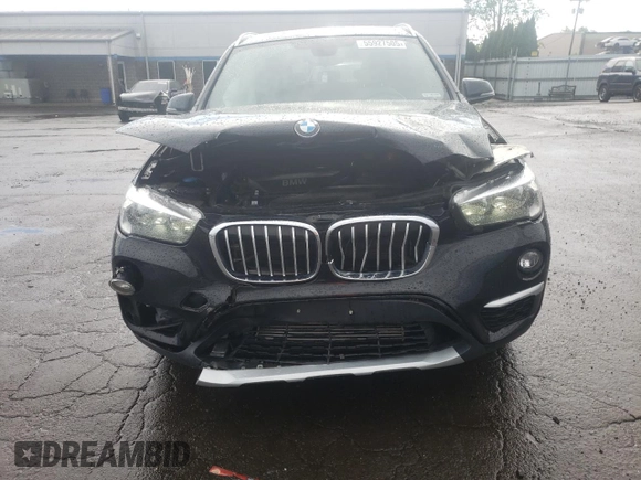 2018 BMW X1 xDrive28i with VIN WBXHT3C35J3H30946, listed as a Copart auction lot 55927505 with 69,626 mi miles and Salvage title. Bid and sale history available at DreamBid. Image 5.