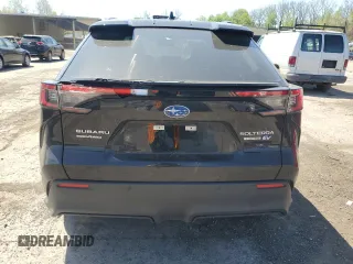 2023 Subaru Solterra Limited z VIN JTMABABA1PA024533, wystawiony jako Copart lot #54735625 z przebiegiem 7604 mil mil oraz Szkody całkowita. Historia ofert i sprzedaży dostępna na DreamBid. Obrazek 6.