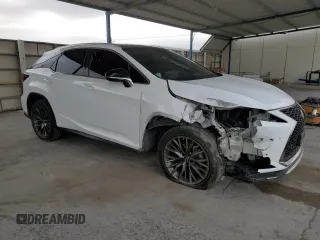 2020 Lexus RX with VIN 2T2YZMDA6LC250402, listed as a Copart auction lot 87664115 with 103,534 mi miles and Salvage Title. Bid and sale history available at carsss.com. Image 4.