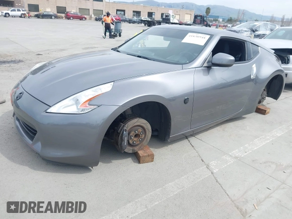 2012 Nissan 370Z Touring with VIN JN1AZ4EH4CM561415, listed as a IAAI auction lot 41838948 with 111,298 mi miles. Bid and sale history available at carsss.com. Image 18.