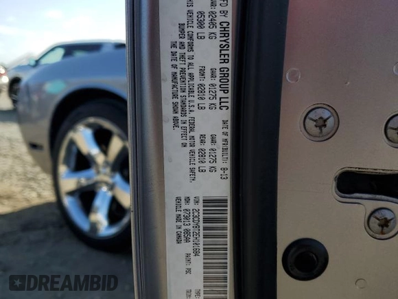 2014 Dodge Challenger R/T z VIN 2C3CDYBT2EH101684, wystawiony jako Copart lot #53581785 z przebiegiem 159 637 mil mil oraz Szkoda całkowita • Salvage title. Historia ofert i sprzedaży dostępna na DreamBid. Obrazek 13.