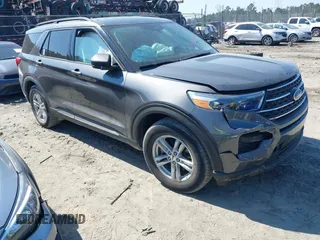 2020 Ford Explorer XLT with VIN 1FMSK7DH0LGB14180, listed as a IAAI auction lot 41671804 with 76,677 mi miles. Bid and sale history available at carsss.com. Image 1.