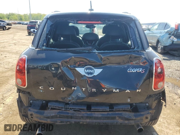 2013 MINI Countryman S ALL4 z VIN WMWZC5C54DWP34353, wystawiony jako Copart lot #57059295 z przebiegiem 154 012 mil mil oraz Szkoda całkowita • Salvage title. Historia ofert i sprzedaży dostępna na DreamBid. Obrazek 6.