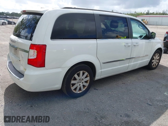 2016 Chrysler Town & Country Touring with VIN 2C4RC1BG8GR293872, listed as a IAAI auction lot 41948314 with 194,780 mi miles. Bid and sale history available at carsss.com. Image 4.