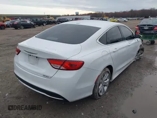 2015 Chrysler 200 Limited with VIN 1C3CCCAB8FN675942, listed as a IAAI auction lot 41956660 with 121,441 mi miles. Bid and sale history available at carsss.com. Image 4.