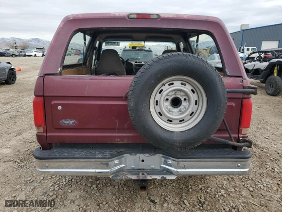1996 Ford Bronco XL with VIN 1FMEU15N6TLB84413, listed as a Copart auction lot 84957264 with 208,633 mi miles and Salvage Title. Bid and sale history available at carsss.com. Image 6.