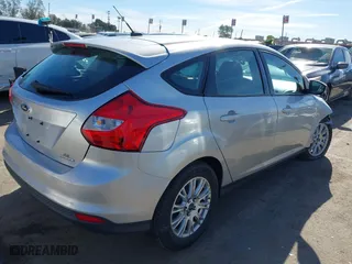 2012 Ford Focus SE with VIN 1FAHP3K27CL416859, listed as a IAAI auction lot 41418565 with 114,525 mi miles. Bid and sale history available at carsss.com. Image 4.