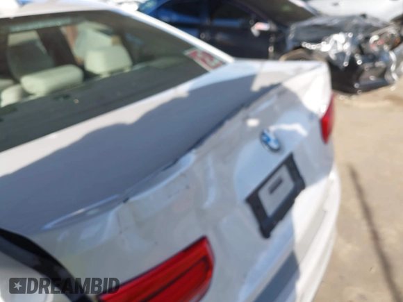 2016 BMW 3 Series 328i with VIN WBA8E9G58GNT47869, listed as a IAAI auction lot 41594120 with 57,561 mi miles. Bid and sale history available at carsss.com. Image 6.