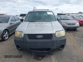 2002 Ford Escape XLT Choice with VIN 1FMYU04152KA39941, listed as a IAAI auction lot 41753639 with 209,016 mi miles. Bid and sale history available at carsss.com. Image 6.
