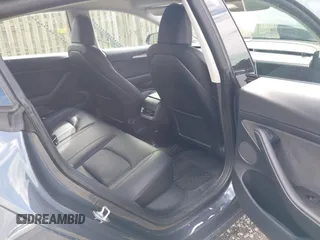 2023 Tesla Model 3 with VIN 5YJ3E1EA4PF515844, listed as a IAAI auction lot 42321123 with 46,683 mi miles and . Bid and sale history available at DreamBid. Image 8.