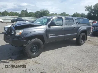 2014 Toyota Tacoma z VIN 3TMLU4EN2EM163797, wystawiony jako Copart lot #61078805 z przebiegiem 130 748 mil mil oraz Szkoda całkowita • Salvage title. Historia ofert i sprzedaży dostępna na DreamBid. Obrazek 1.
