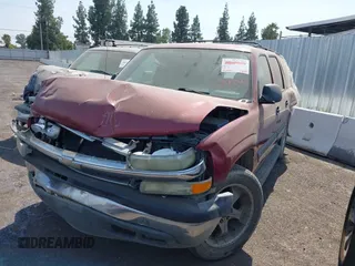 2004 Chevrolet Suburban LT with VIN 3GNEC16T54G282083, listed as a IAAI auction lot 40193048 with Not provided miles and . Bid and sale history available at DreamBid. Image 2.