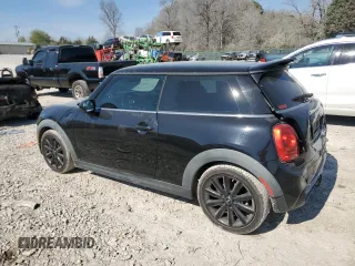 2016 MINI Hardtop S with VIN WMWXP7C55G3B49216, listed as a Copart auction lot 50579275 with 107,977 mi miles and Salvage Title. Bid and sale history available at DreamBid. Image 2.