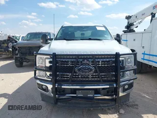 2023 Ford F-250 XL with VIN 1FT7W2BT2PEC64642, listed as a IAAI auction lot 42661561 with 22,936 mi miles and . Bid and sale history available at DreamBid. Image 12.