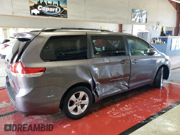 2011 Toyota Sienna LE AAS with VIN 5TDKK3DC8BS117009, listed as a Copart auction lot 56035065 with 148,160 mi miles and Salvage Title. Bid and sale history available at DreamBid. Image 3.