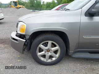 2007 GMC Envoy SLE z VIN 1GKDT13S472253627, wystawiony jako IAAI lot #42292399 z przebiegiem 204 263 mil mil oraz . Historia ofert i sprzedaży dostępna na DreamBid. Obrazek 14.