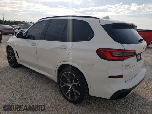 2020 BMW X5 sDrive40i with VIN 5UXCR4C02LLW63576, listed as a Copart auction lot 71912802 with 27,686 mi miles. Bid and sale history available at carsss.com. Image 2.