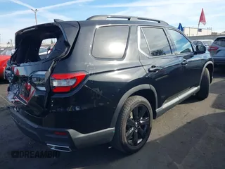 2025 Honda Pilot Black Edition with VIN 5FNYG1H99SB017956, listed as a IAAI auction lot 41401879 with 5,385 mi miles. Bid and sale history available at carsss.com. Image 4.