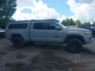 2021 Toyota Tacoma SR5 with VIN 3TMDZ5BN3MM112338, listed as a IAAI auction lot 42241704 with 81,346 mi miles and . Bid and sale history available at DreamBid. Image 13.
