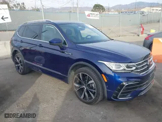 2022 Volkswagen Tiguan SEL R-Line with VIN 3VV4B7AX3NM154238, listed as a IAAI auction lot 40995659 with 23,437 mi miles. Bid and sale history available at carsss.com. Image 1.