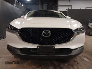 2021 Mazda CX-30 Preferred z VIN 3MVDMBCL2MM210902, wystawiony jako IAAI lot #42522203 z przebiegiem 42 995 mil mil oraz . Historia ofert i sprzedaży dostępna na DreamBid. Obrazek 13.