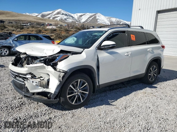 2019 Toyota Highlander SE z VIN 5TDJZRFH5KS570491, wystawiony jako Copart lot #50373435 z przebiegiem Nie podano mil oraz Szkoda całkowita • Salvage title. Historia ofert i sprzedaży dostępna na DreamBid. Obrazek 1.