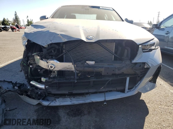 2024 BMW i5 eDrive40 with VIN WBY33FK01RCN99702, listed as a Copart auction lot 78737934 with 11,889 mi miles and Salvage Title. Bid and sale history available at carsss.com. Image 5.