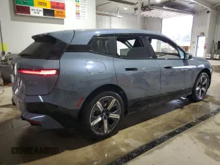 2024 BMW iX xDrive50 z VIN WB523CF0XRCP21815, wystawiony jako Copart lot #51520885 z przebiegiem 6 664 mil mil oraz Szkoda całkowita • Salvage title. Historia ofert i sprzedaży dostępna na DreamBid. Obrazek 3.