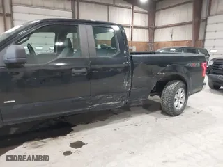 2015 Ford F-150 XLT with VIN 1FTEX1EP4FKE23397, listed as a IAAI auction lot 41665609 with 150,021 mi miles. Bid and sale history available at carsss.com. Image 6.