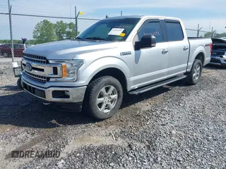 2019 Ford F-150 XL with VIN 1FTEW1EP3KFB61412, listed as a IAAI auction lot 42242393 with 117,503 mi miles and . Bid and sale history available at DreamBid. Image 2.