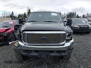 1999 Ford Super Duty F-250 XL with VIN 1FTNX21F2XEC99584, listed as a IAAI auction lot 41611098 with 424,263 mi miles. Bid and sale history available at carsss.com. Image 12.