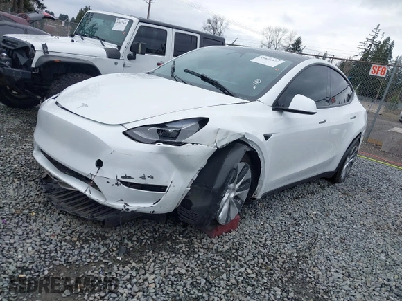 2023 Tesla Model Y Long Range with VIN 7SAYGDEE7PF809164, listed as a IAAI auction lot 41828974 with 31,772 mi miles. Bid and sale history available at carsss.com. Image 19.