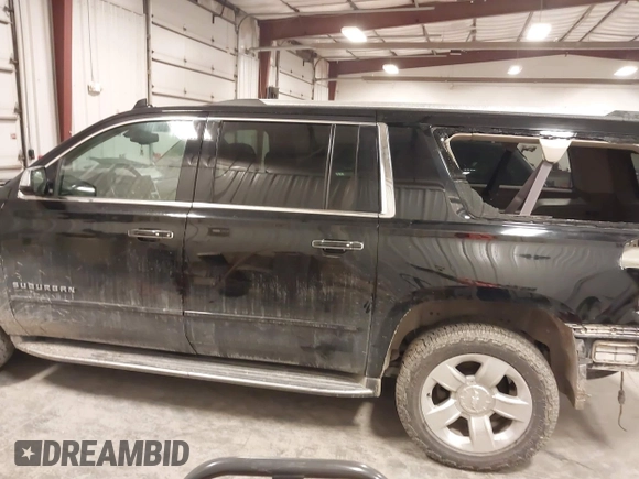 2017 Chevrolet Suburban Premier z VIN 1GNSKJKC0HR250854, wystawiony jako IAAI lot #41541476 z przebiegiem 128 231 mil mil oraz . Historia ofert i sprzedaży dostępna na DreamBid. Obrazek 14.